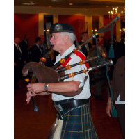 02_entrance_bagpiper.jpg